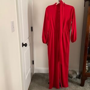 Red Jumpsuit polyester New Never worn elastic sleeve & belt